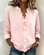 Anora | Blouse à volants et col en V